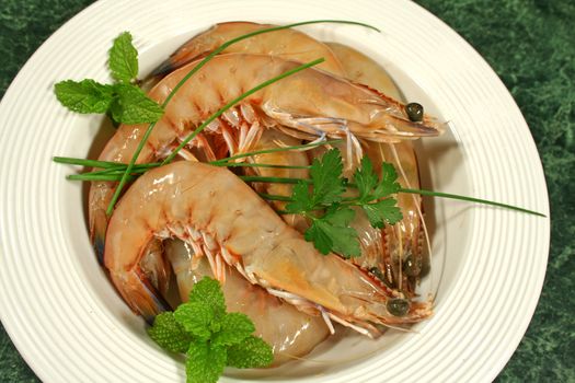 Bowl of fresh green shrimps ready for cooking.