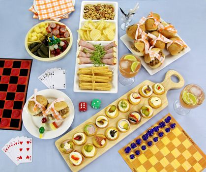 Selection of finger food laid out for a night of board games.