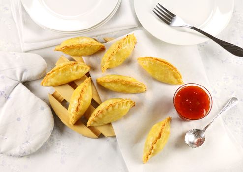 Delicious fresh baked golden pasties with sweet chili relish.