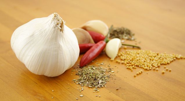 Garlic with chillies, oregano, mustard seeds and basil.