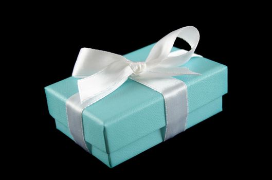Delicate powder blue gift box with silver bow.