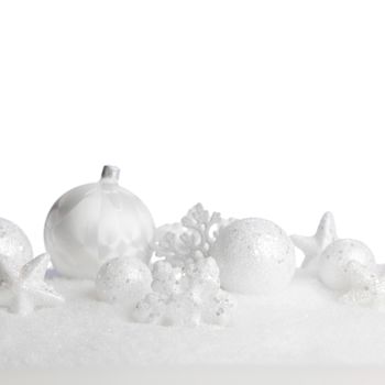 White beautiful Christmas ornaments on snowflakes