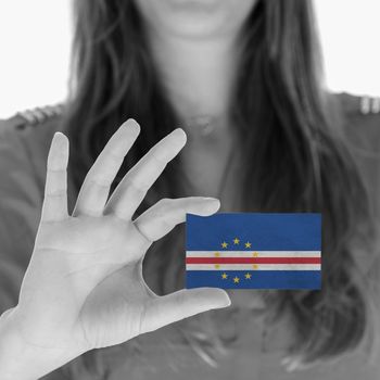 Woman showing a business card, flag of Cape Verde