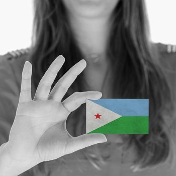 Woman showing a business card, flag of Djibouti