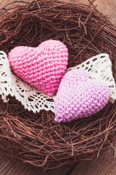 Little cozy nest with two crochet hearts. Valentine's day decorations