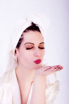 beauty make up. Woman with towel on her head