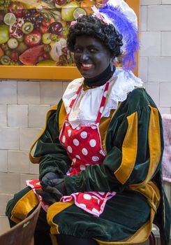 dutch zwarte peit, traditional costume and black face for the sinterklaas party 