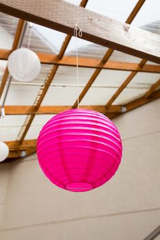 Paper Chinese lanterns are used as decorations or decor for this classy wedding reception.
