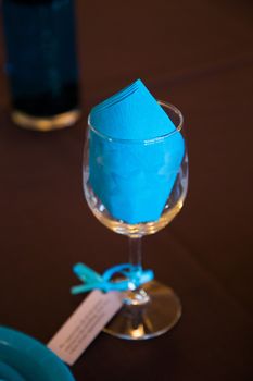 Wine glasses are setup as decor for this wedding reception.