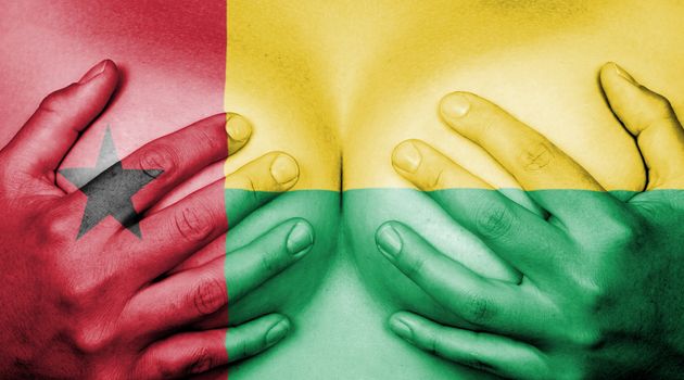 Upper part of female body, hands covering breasts, flag of Guinea-Bissau