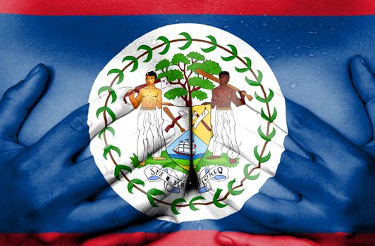 Sweaty upper part of female body, hands covering breasts, flag of Belize