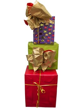 stack of red green and purple presnets wrapped in paper