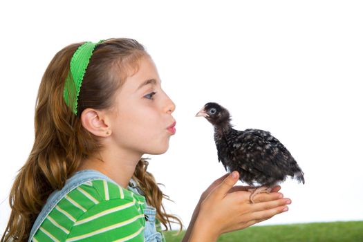 breeder hens kid girl rancher farmer kissing a chicken chick white background