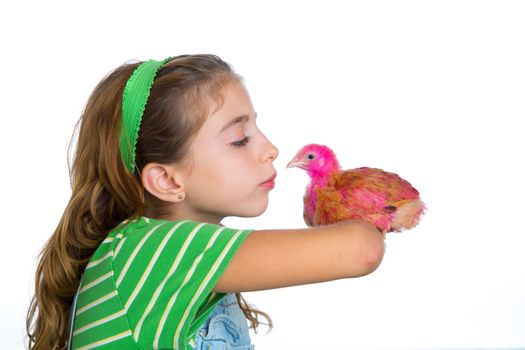 breeder hens kid girl rancher farmer kissing a chicken chick white background