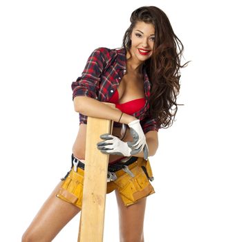 Sexy brunette in a plaid shirt, isolated on white background
