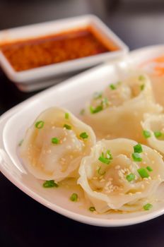 Mandu  , Korean Dumplings , Boiled Pork Gyoza with chili sauce