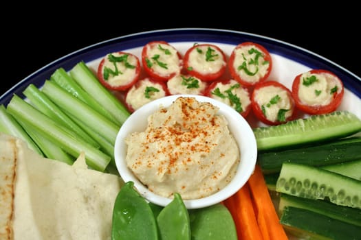 Entertaining platter with a combination of healthy finger food. 