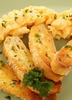 Delicious and healthy breakfast of toast with scrambled eggs.