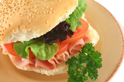 Freshly prepared ham and salad roll ready to serve