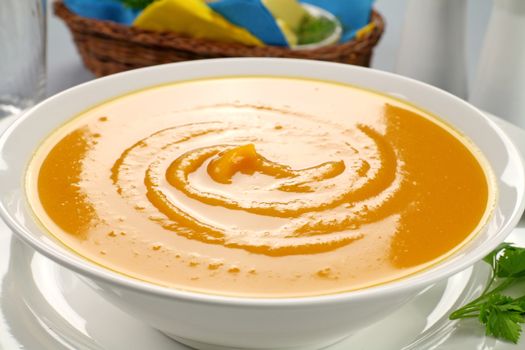 Delicious hearty homemade pumpkin soup ready to serve.