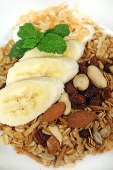 Toasted muesli with fresh banana, coconut and low fat yogurt. 