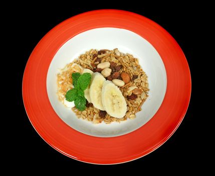 Toasted muesli with fresh banana, coconut and low fat yogurt. 