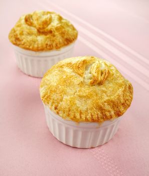Fresh baked golden homestyle chicken pies.