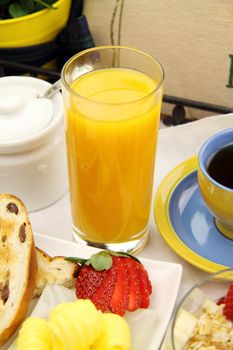 Glass of freshly squeezed orange juice served for breakfast.