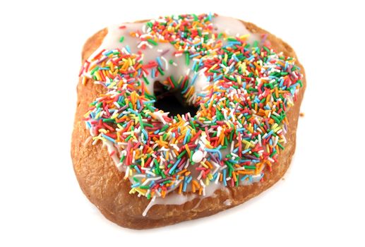 Sweet doughnut covered with colorful hundreds and thousands.