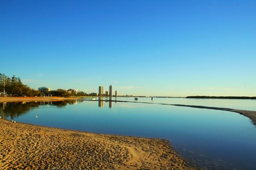 The view to Runaway Bay looking  across Ian Dipple Lagoon at Labrador Gold Coast Australia at sunrise.