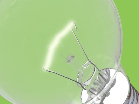 Close up of lightbulb on green background