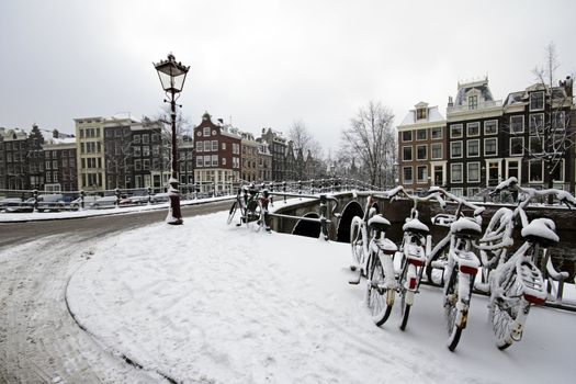 Amsterdam covered with snow  in winter in the Netherlands