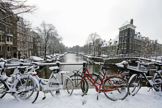 Amsterdam covered with snow  in winter in the Netherlands