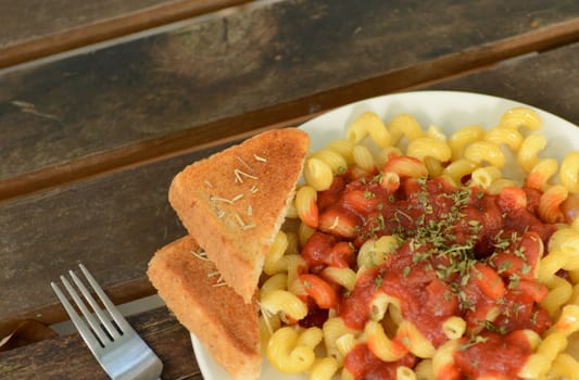 rustic tuscan pasta on wood table