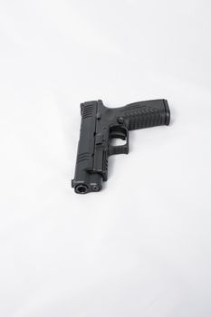 Black hand gun on white background with details