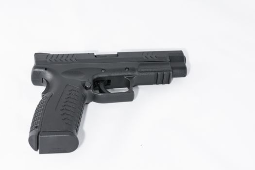 Black hand gun on white background with details