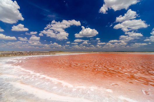 Red and white pool for salt production in La Guajira, Colombia