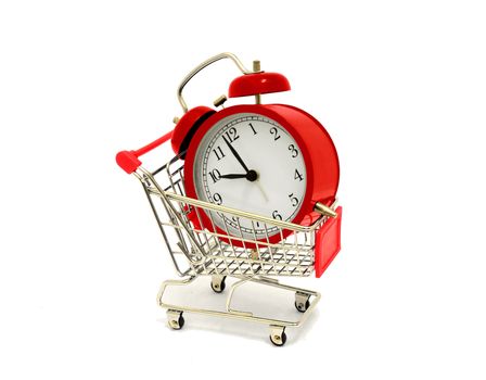 Buying concept with Red Clock and Shopping Cart
