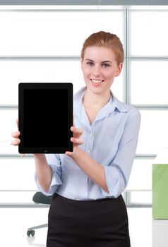 Young Businesswoman Holding Digital Tablet in office