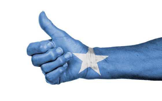 Old woman giving the thumbs up sign, isolated, flag of Somalia