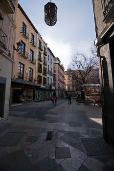 Access to bibarrambla square for salamanca street on mid afternoon. Granada, Spain