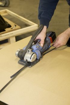 Close up of a man with industrial machine