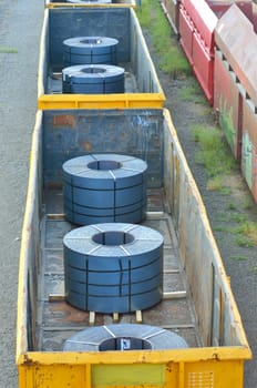 Cargo train platform with role steel seen from above