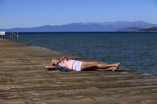 Adult woman on vacation at a lake Tahoe
