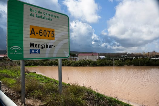 Guadalquivir River passing through Andujar, Jaen province, Andalusia, Spain