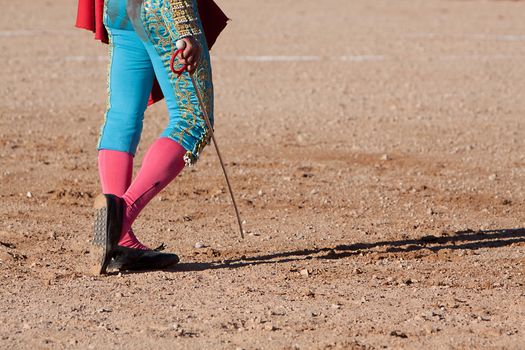 Bullfighting walking on the sand with his sword, Spain