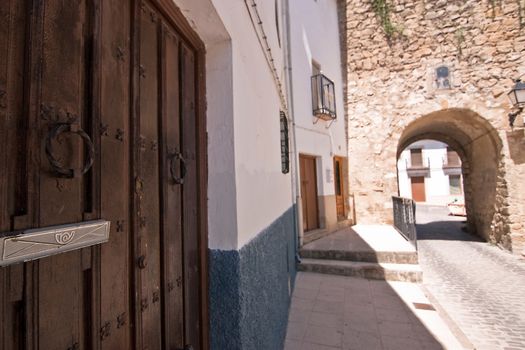 Street and Mudejar door of Sabiote, Jaen province, Andalusia, Spain