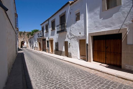 Street of Sabiote and Arabic door, Sabiote, Jaen province, Andalusia, Spain