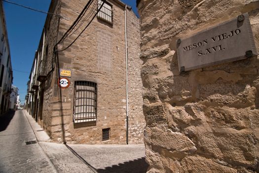 Argolla Street of Sabiote and cartel of Meson Viejo, Sabiote, Jaen province, Andalusia, Spain