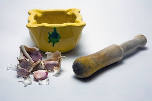   Ceramic mortar and garlic, used in the Spanish traditional kitchen, Spain
